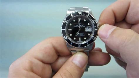 rolex submariner winding direction.